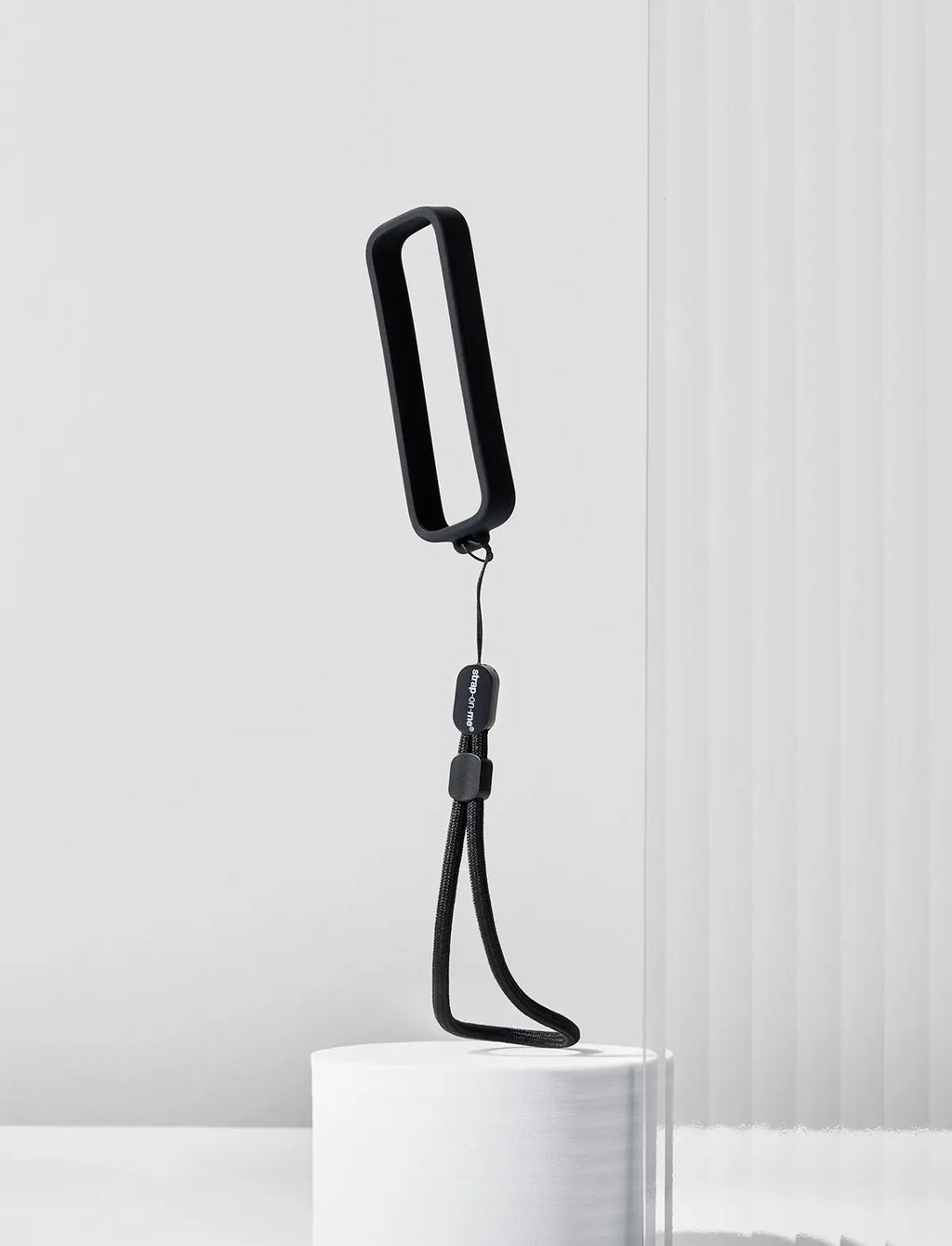 Strap-on-Me remote attachment for secure fastening and convenient use