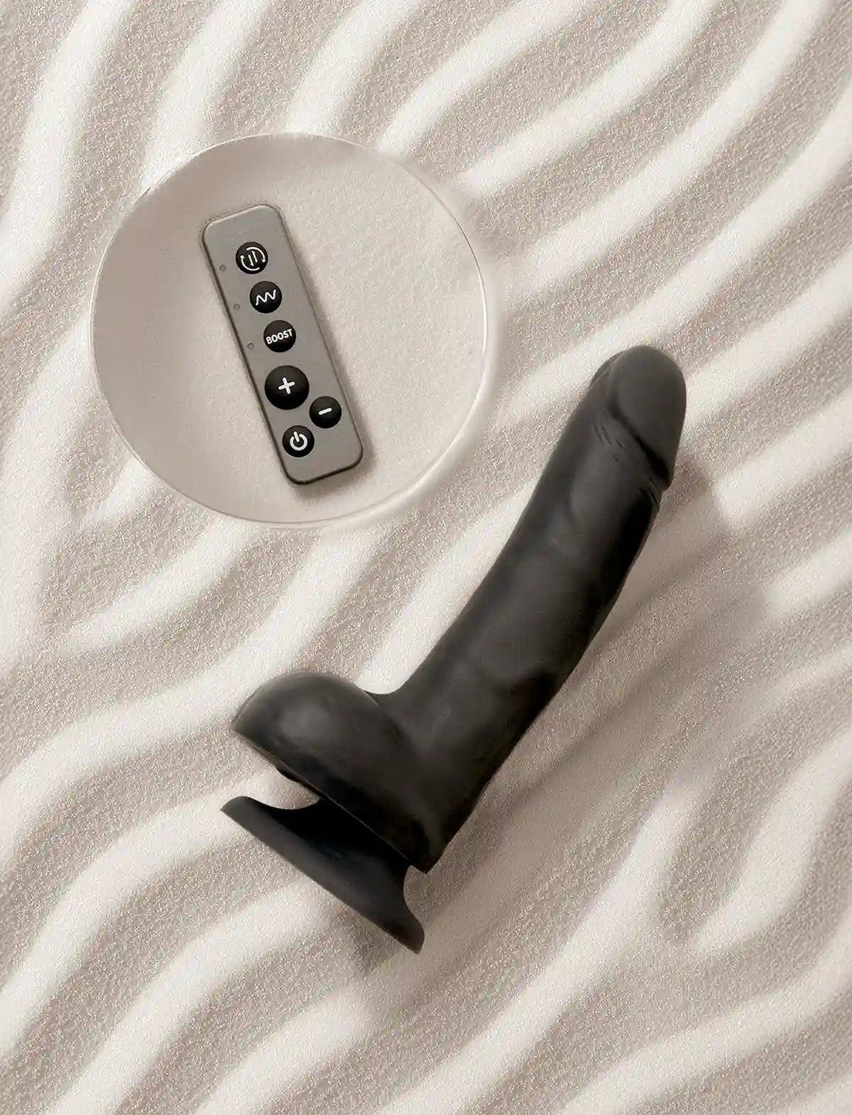 Rotating vibrating realistic dildo Strap-on-Me in black with lifelike texture and ergonomic design for versatile and comfortable use