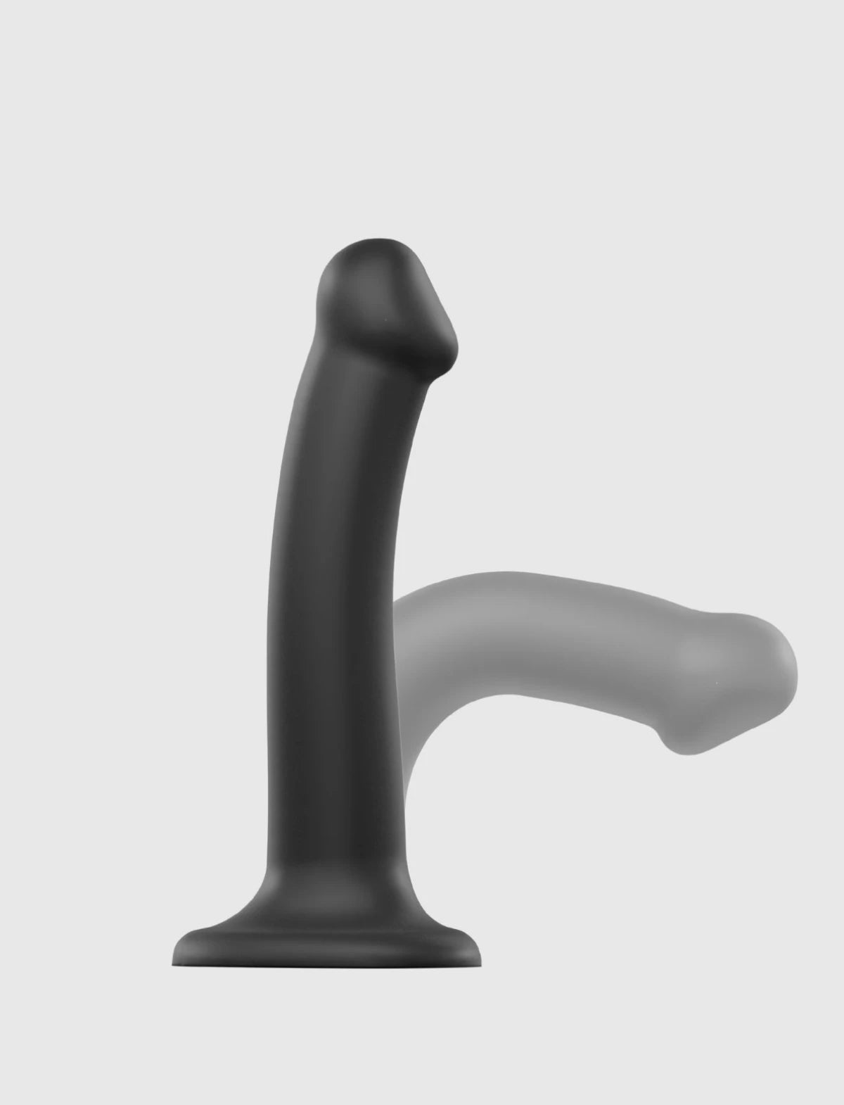 Semi-realistic bendable double-density dildo Strap-on-Me in black with lifelike texture and flexible ergonomic design for versatile use