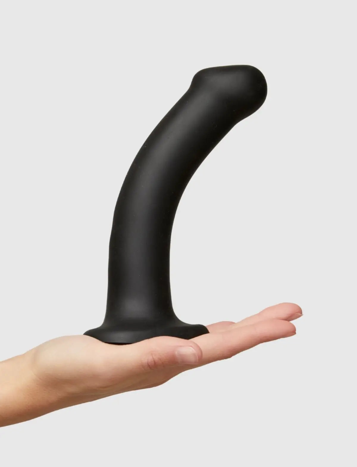 Semi-realistic bendable double-density dildo Strap-on-Me in black with lifelike texture and flexible ergonomic design for versatile use