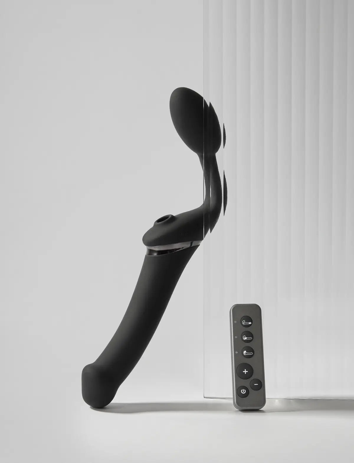 Rechargeable remote-controlled Strap-on-Me with 3 motors in black, designed for powerful performance and customizable vibration modes