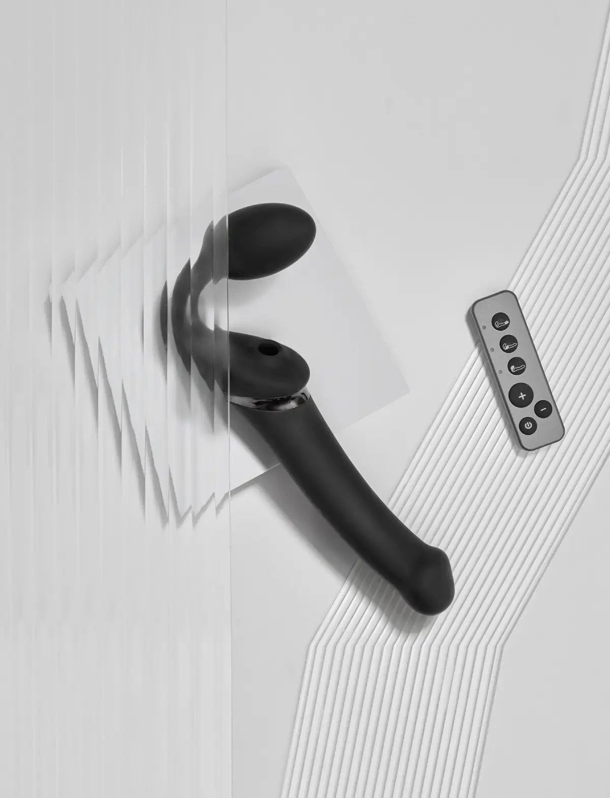 Rechargeable remote-controlled Strap-on-Me with 3 motors in black, designed for powerful performance and customizable vibration modes
